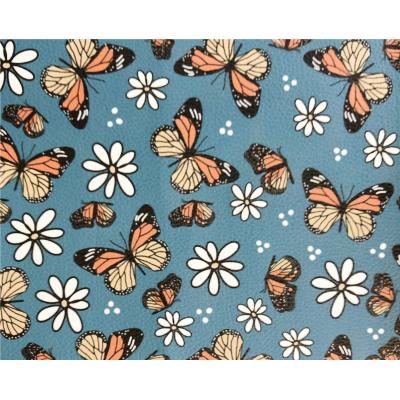 China New Product Waterproof Faux Leather Butterfly Printed Fabric For Bows Clip for sale