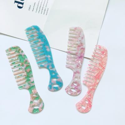 China Comfortable Light Color Cutout Circle Hanging Pattern Hair Comb Floral Marble Stone Print Resin Anti Static Acid Curls Combs for sale