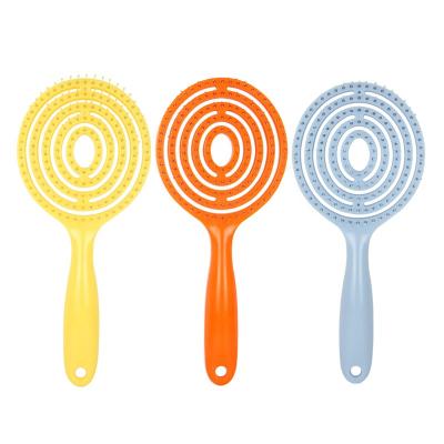 China Custom Logo Fashional Cute Plastic Paddle Duct Brush Paddle Anti-static Hair Styling Flexible Curved Hair Brush for sale