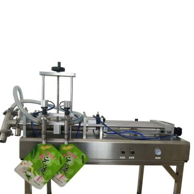 China 100-1000ml Automatic Salad Sauce Dressing Meat Paste Stand Up Semi Automatic Pouch Filling Machine for sale