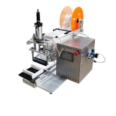 China Manual Label Apply For Cosmetics Coffee Round Plastic Bottle Self Adhesive Stick Labeling Machine for sale