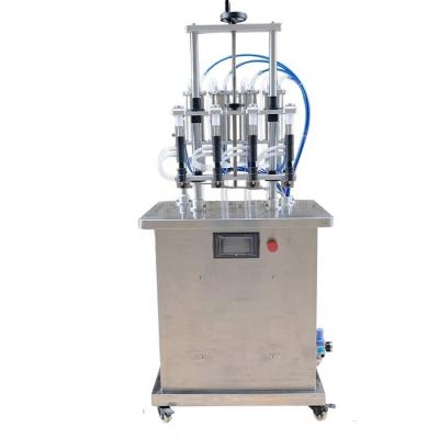 China Semi Automatic Fast Speed Water Liquid Desktop Small Volume Double Nozzles Liquid Filling Machine for sale