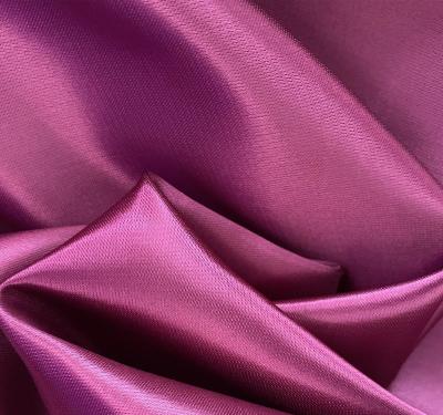 China Breathable Wholesale Shiny Soft Beautiful Polyester Satin Fabric Glitter Plain Dyed Satin Fabric for sale