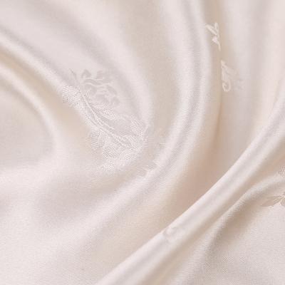 China Longevity China Satin Long Lasting Popular Small Flower Jacquard 114 Cm 100% White Silk Fabric for sale