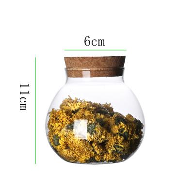 China Alternating heat and cold without cracking low price non-slip borosilicate glass jar high and white transparent circular glass heat resistant for sale