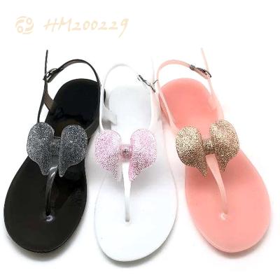 China Women's Arc-knot PVC Sandals Glitter Light Buckle Flip Flop Sandals HM200229 for sale