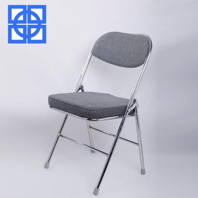 China Lightweight wholesale cheap folding metal frame fabric upholstery chairs for wedding or banquette for sale