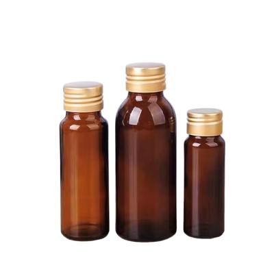 China Reagent Bottle Amber Empty Glass Lean Bottles Oral Liquid Oral Cough Syrup Bottles Amber Glass Bottle With Aluminum Pharmaceutical Gold for sale