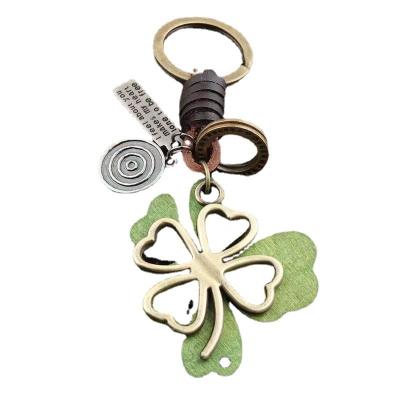 China Wholesale Europe Keychain Manufacturer Make Your Own Clover Lucky Plant Transparent Empty Printed Key Chain for sale