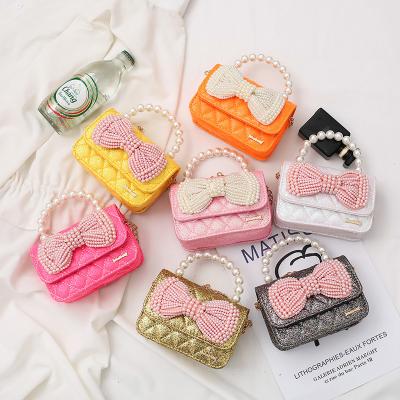 China Fashion New Arrival Bow Kids Beads Cross - Cute Body Bag Baby Girl Mini Shoulder Chain Bag For Children for sale