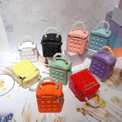 China Wholesale PVC Jelly Tote Bag Candy Handbag Rivet Fashion Silicone Jelly Shoulder Bag for sale