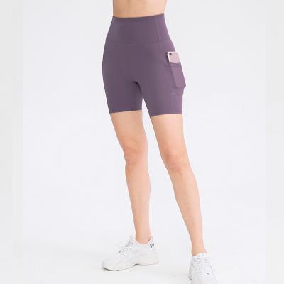 China Gym Running Fitness Yoga Sweat-Wicking Girls Pocket Pants Solid Color Elasticity Sports Tight Sexy High Shorts for sale