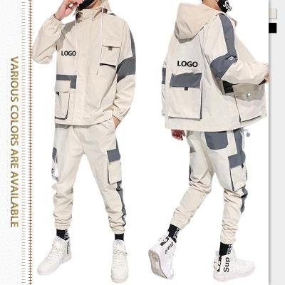 China Breathable Zipper Sweat Suit Multi Pocket Cargo Pants Amazon Outdoor Sport Mens Luxury Sportswear Mens Tracksuits for sale