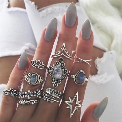 China Nickel Free European and American Ring Set Bohemian Hollow Sunflower Gem Retro Ring black geometric set of 15 pieces for sale