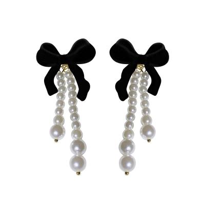 China 925 Silver Lead Free Nickel Free Needle Flocking French Retro Bow Pearl Tassel Earrings Temperament Minority Fringe Earrings Women for sale