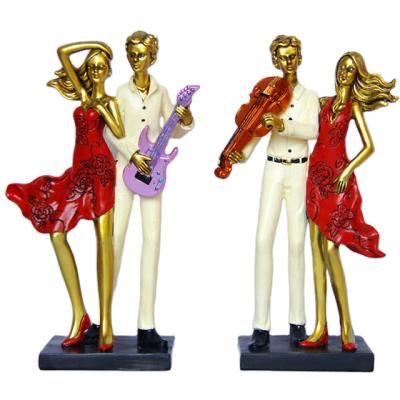 China China Custom Resin Wedding Gift Lovers Figurines Music Statues Polyresin Figures for sale