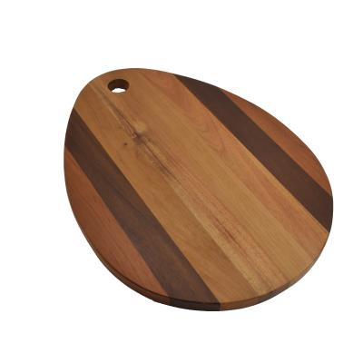 China Sustainable Sound Parquet Ellipse Shape Solid Two Tone Hole Convenient Handle Custom Wood Cutting Board Chopper for sale