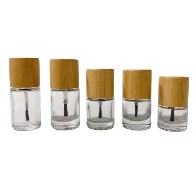 China Personal Care YJ Wholesale 5ml10ml15ml Bamboo Wooden Lid Nail Polish Bottle with Brush Transparent Glass Nail Art Dispenser Bottle for sale