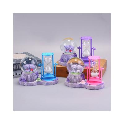 China Europe Hourglass Ball Snow Globe Custom The Music Box Crystal Ball Art Decorations for sale