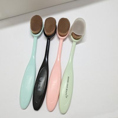 China skin-friendly soft toothbrush shaped base make up tool oval shape makeup brush for sale