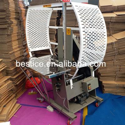 China CLOTHING plastic strapping machine factory for sale