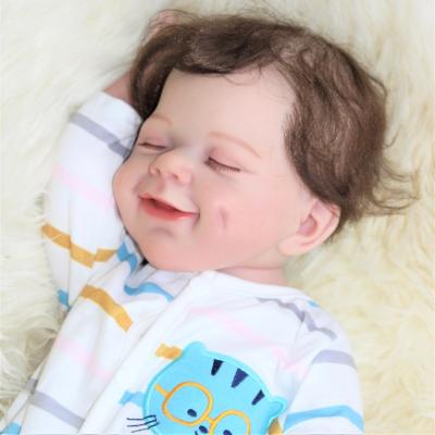 China Changeable Lifelike Clothing 18inches 45 cm Full Body Silicone Vinyl Realistic Close Eyes Reborn Baby - Doll For Girls Boys for sale