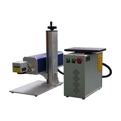 China Laser Marking Lovely Mini Portable 30w 50w 100w CO2 Laser Marking Machine For Sale for sale