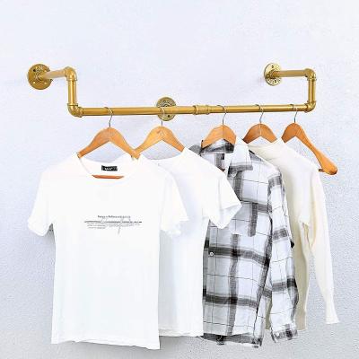 China Industrial Glod Stocked Pipe Wall Mounted Clothing Rack , Vintage Retail Garment Rack Display Rack Fabrics Rack , Commercial Metal Clothes Ra for sale