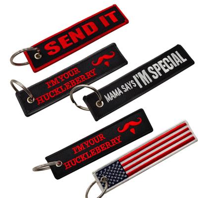 China Durable Wholesale Customized Embroidery Woven Car Shaped Motorcycle Bag Luggage Logo Remove Before Flight Keychains for sale