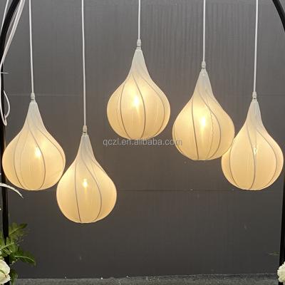 China Ceiling Decoration Wedding Props Honeycomb Ceiling Lamp Wedding Stage Ceiling Decoration Lamp String Fabric Chandelier for sale