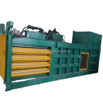 China Beverage Hydraulic Press Packing Machine / Vertical Outer Garment Packer Compress Used Clothes Press for sale