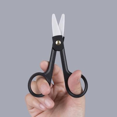 China No Rust Fishing Accessories Tool 1 Inch Ceramic Fly Fish Serrated Blade Line Scissors for sale