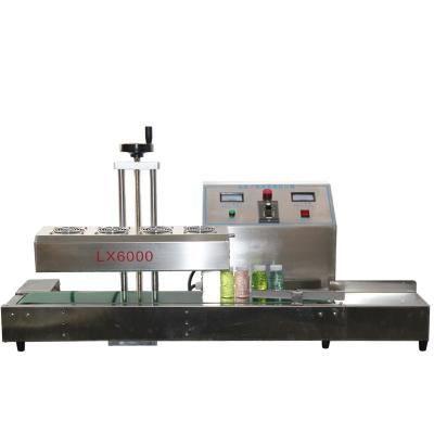 China LX600 Food Round Bottle Plastic Continuous Electromagnetic Induction Sealing Machine for sale