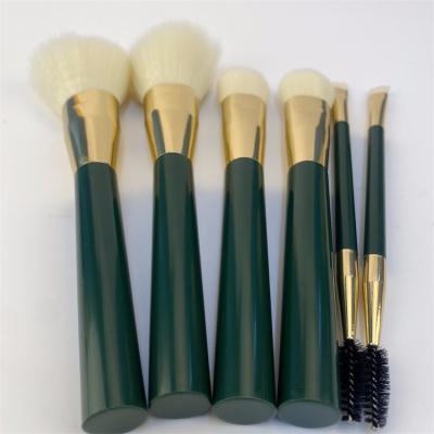 China Angular Blush New Arrival Top Quality Makeup Foundation Brushes Green Handle Brushes Makeup Sets Bags en venta