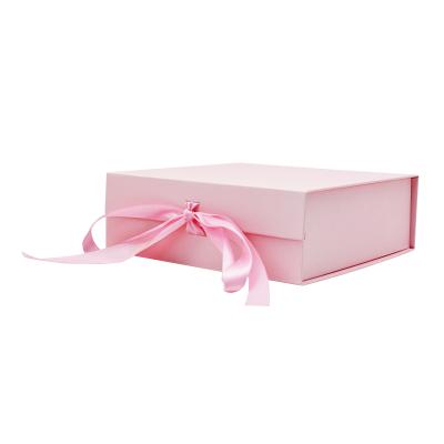 China Biodegradable Custom Luxury Pink Cardboard Flat Wholesale Storage Low Price Folding Paper Packaging Gift Boxes With Ribbon for sale