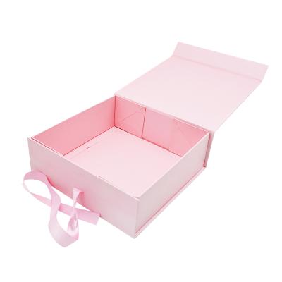 China Factory Wedding Biodegradable Stock Rigid Cardboard Packaging Magnetic Folding Paper Gift Boxes With Ribbon Closure for sale