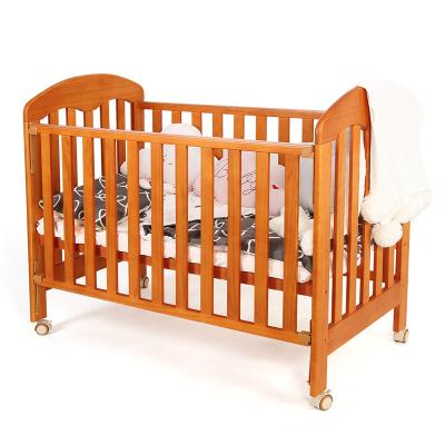 China Eco-Friendly Wooden Crib Height-Adjustable Solid Wood Cribs Removable And Lightweight Crib for sale