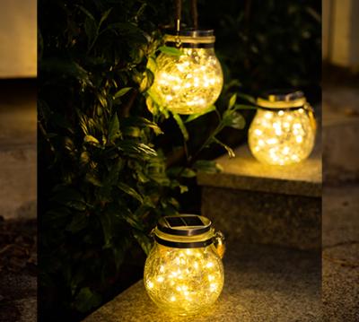 China Hanging Slot Mason Jar Copper String Lights Solar Mason Jar Lid Lights Wholesale Solar Crackle Outdoor Glass Decoration Garden for sale