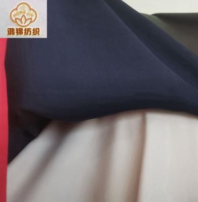 China Organic Wholesale Polyester Spandex 4 Way Twill Stretch Plain Dyed Stock Solids Fabric for sale