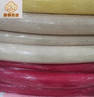 China Colorful Wholesale Cheap Price Stock 100% Cotton Organic Punch Embroidery Fabric for sale