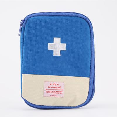 China Travel Emergency Survival Medicine Small Portable First Aid Kit Storage Pouch Outdoor Camping Medical Bag Stored for sale