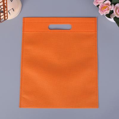 China 40*50cm 15.74*19.68inch BIODEGRADABLE nonwoven bags for clothing packaging party bags nonwoven goodie bags for sale