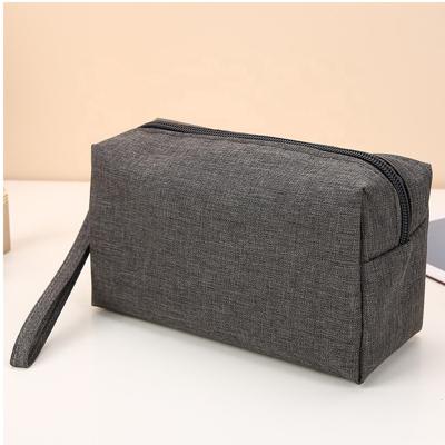 China High Quality And Durable Stock Big Pouch Kits Cheap Prices Nylon Cosmetic Hand Holding Cosmetic Bag Fast Delivery Travel Makeup Bag With Low MOQ for sale