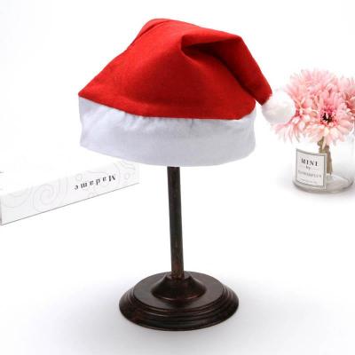 China Hot Sale Low Price Nonwoven Christmas Hats , Christmas Santa Hats Nonwoven Christmas Hats for sale