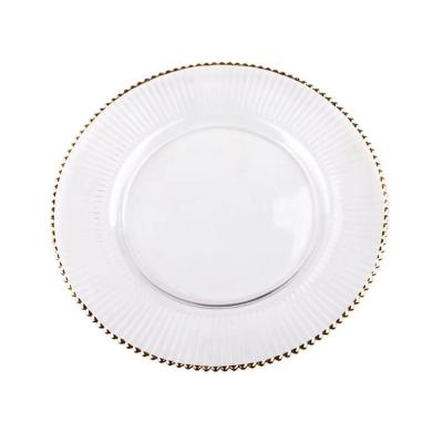 China Viable Wholesale Wedding Dinner Dishes Amazon Grain 13inch Gold Wave Rim Charger Vertical Glass Dishes Sets for sale