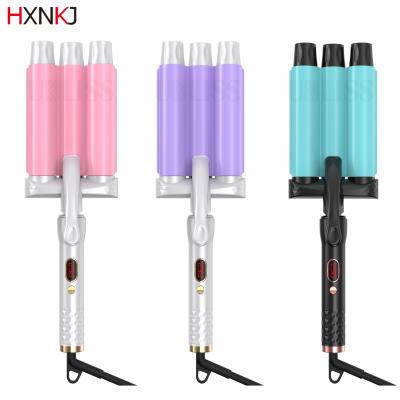 China New Three Barrel Big Wave Ceramic Home Use Ionic Hair Curler LCD Automatic Curling Iron With Triple Barrel Hair Diffuse Hair Curler for sale