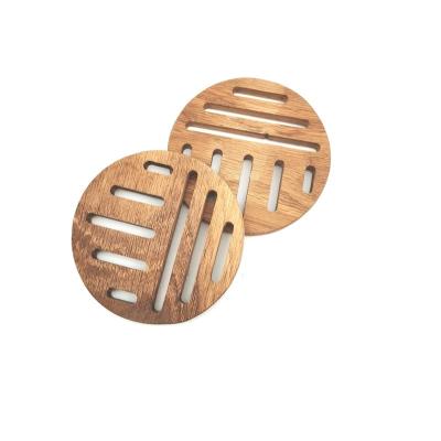 China Viable Kitchen Accessory Acacia Wood Resin Insulated Hot Pot Pan Holder Trivets Round Acacia Wood Coaster For Dishes And Pans With Air for sale