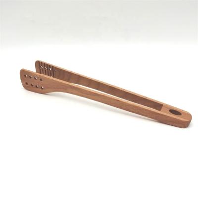 China 5pcs/lot Viable For Sale Eco-friendly Kitchen Bread Salad BBQ Food Clip Wooden Toaster Tongs Direct From Factory for sale