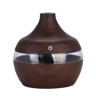 China Household 2020 New 500ml Ultrasonic With Seven Night Colored Light Mist Wood Grain Diffuser Cool Air Humidifier for sale