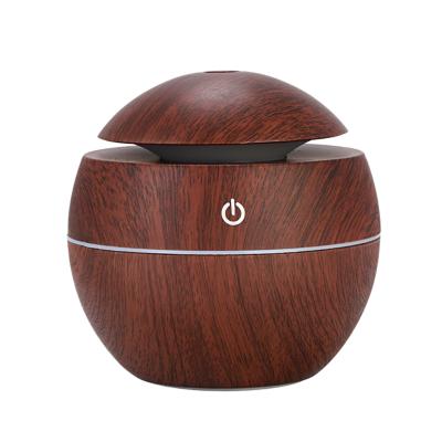 China 130ml Household Customized Seven Color Light Electric Woodfiber Ultrasonic Humidifier for sale